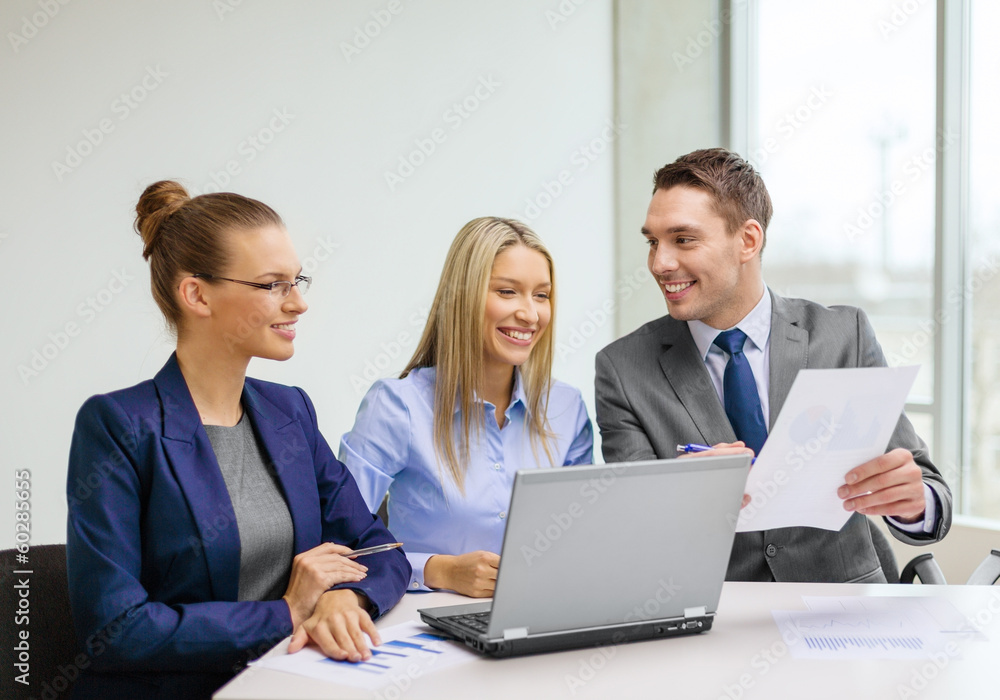 business team with laptop having discussion business team with laptop having discussion