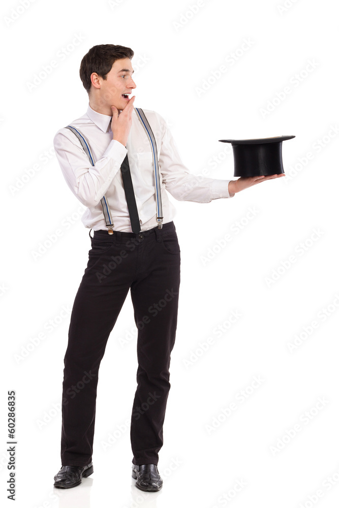 Product jumping out from magicians top hat. Product jumping out from magicians top hat.