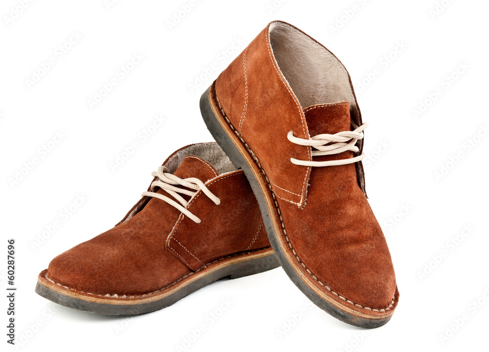 pair of brown suede shoes pair of brown suede shoes