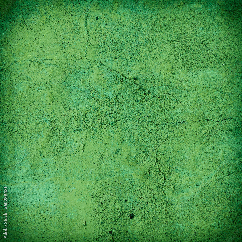 Cracked green concrete wall texture