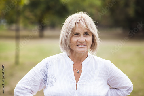 senior woman in park portrait