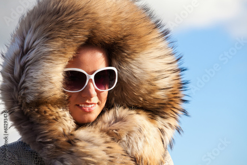 Beauty Fashion Model Girl in Fur Coat.