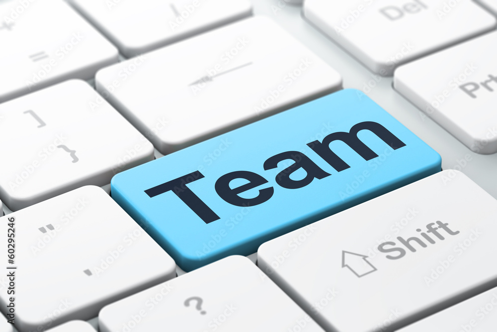 Business concept: Team on computer keyboard background Business concept: Team on computer keyboard background