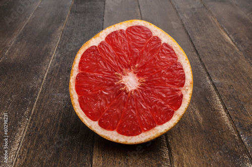 Grapefruit on wooden background