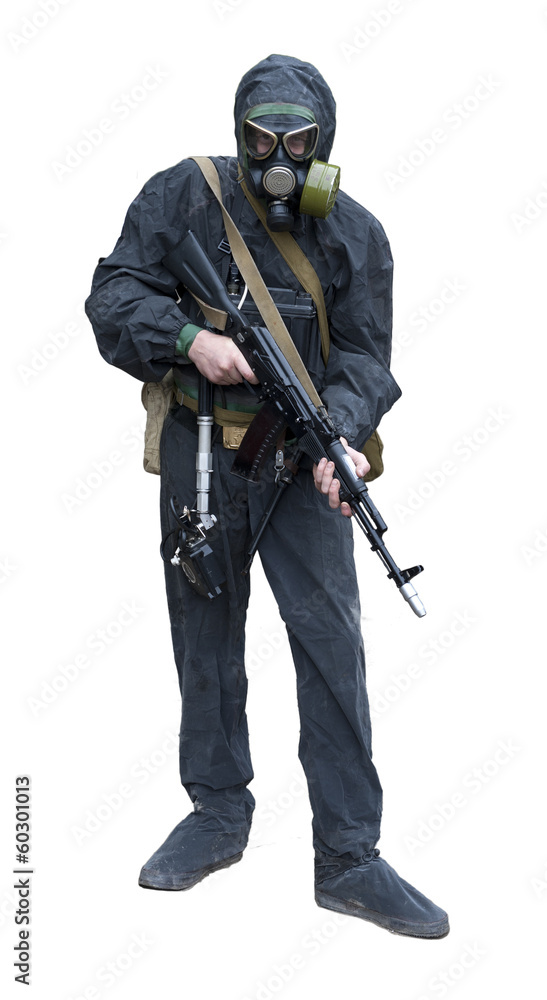 Sailor marine in chemical protective suit with a gun in Sailor marine in chemical protective suit with a gun in