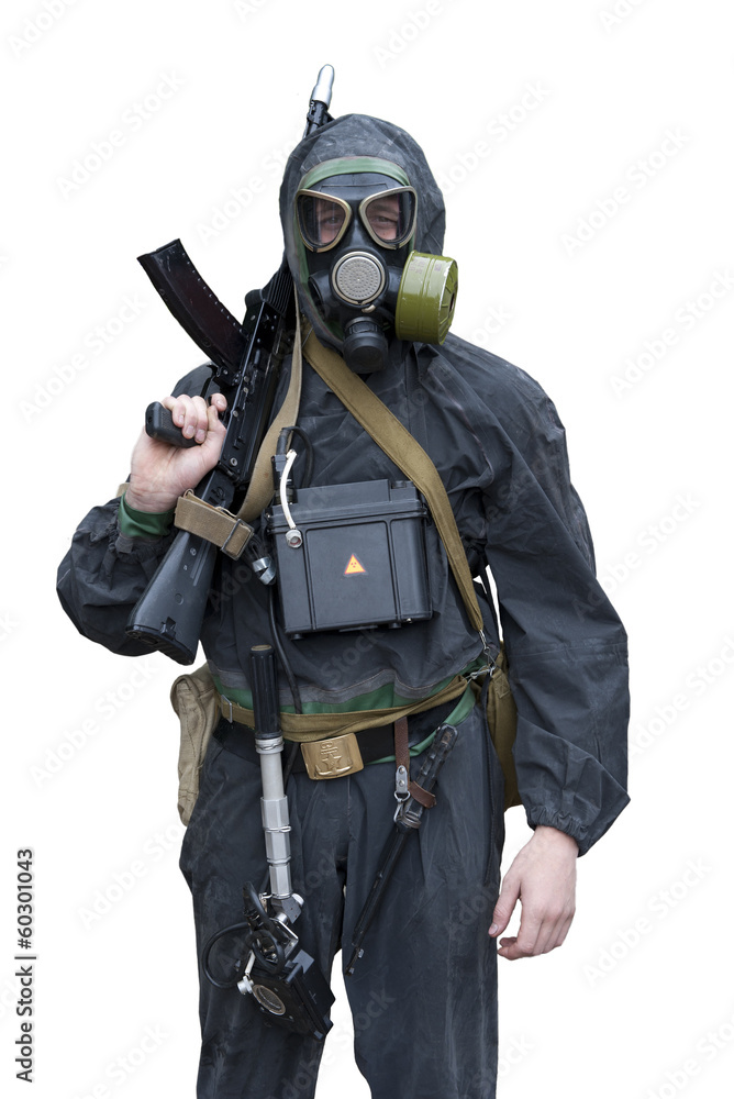 Sailor marine in chemical protective suit with a gun in Sailor marine in chemical protective suit with a gun in