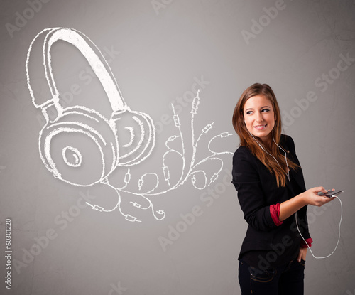 young woman singing and listening to music with abstract headpho photo