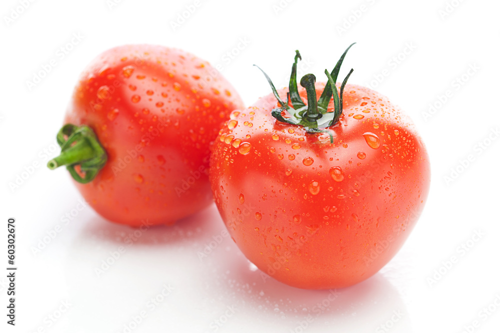 tomato with water drops isolated on white tomato with water drops isolated on white