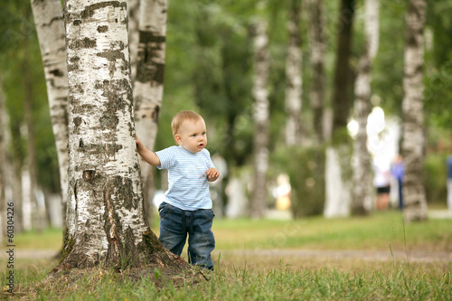 cheerful little boy in the park
