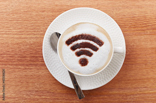 Free wifi area sign on a latte coffee