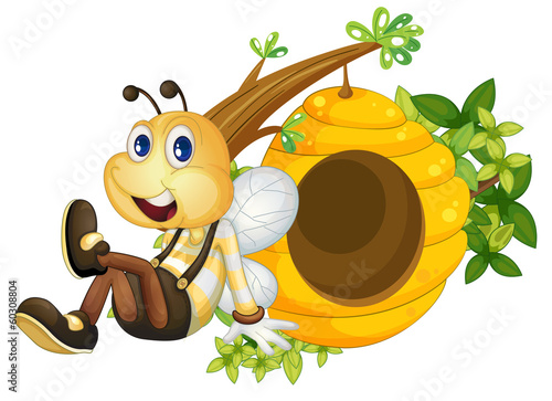 A bee sitting beside the beehive