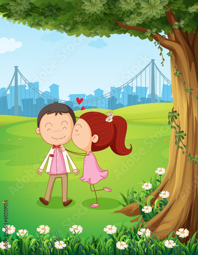 A sweet couple under the tree