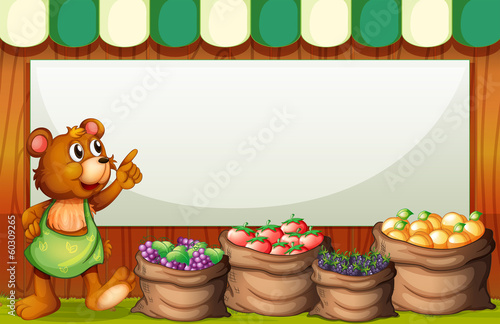 An empty rectangular template with a bear selling fruits