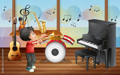 A kid with musical instruments