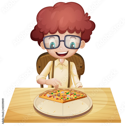 A happy boy eating pizza