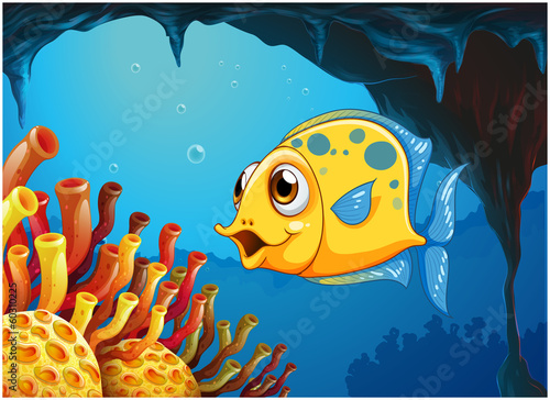 A big yellow fish under the sea inside the sea cave