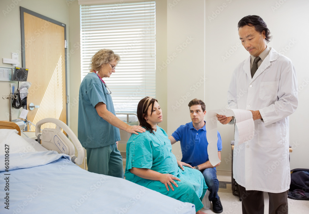 Doctor Examining CTG print Doctor Examining CTG print