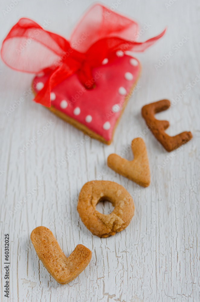 Heart shaped valentine cookies on a wooden board Heart shaped valentine cookies on a wooden board