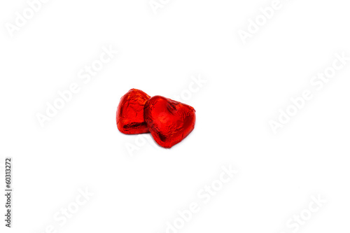 Two heart-shaped chocolate pieces