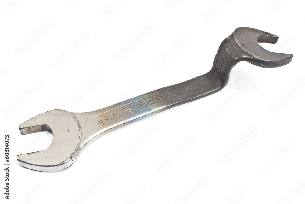 Old rusty bent spanner isolated on white Old rusty bent spanner isolated on white