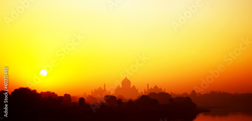 Taj Mahal at sunset in India photo