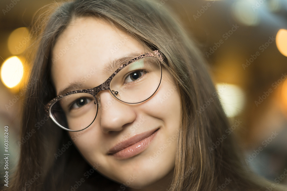 face of the girl in glasses closeup face of the girl in glasses closeup