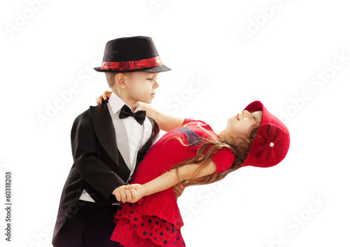Lovely little boy and girl dancing