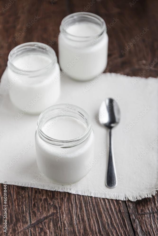 Three jars of fresh yogurt Three jars of fresh yogurt