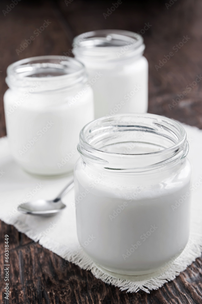 Three jars of fresh yogurt Three jars of fresh yogurt