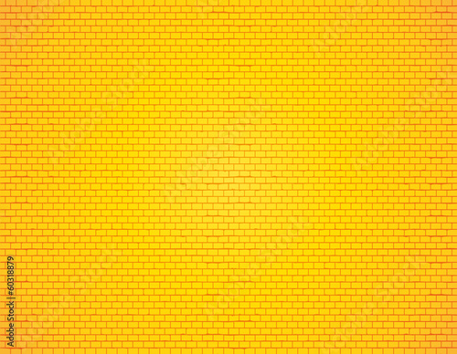Yellow brick wall background. photo