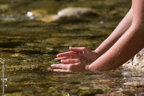 Hands in the river