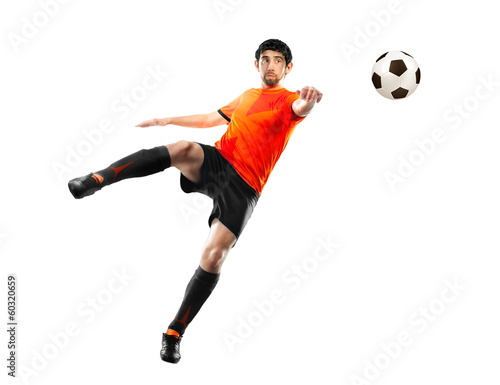 football player striking the ball  isolated
