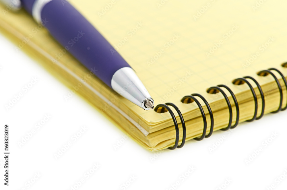 notepad and pen isolated on white background notepad and pen isolated on white background