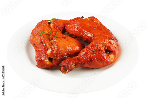 фотографія tandoori chicken legs in plate