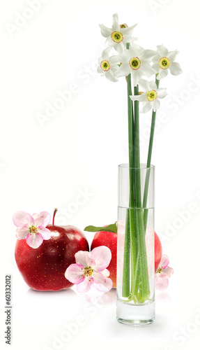 Isolated image of flowers in a vase and apples