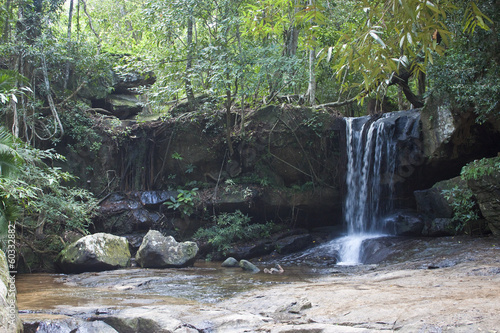 Waterfall in jungle at Kbal Spean in Cambodia photo