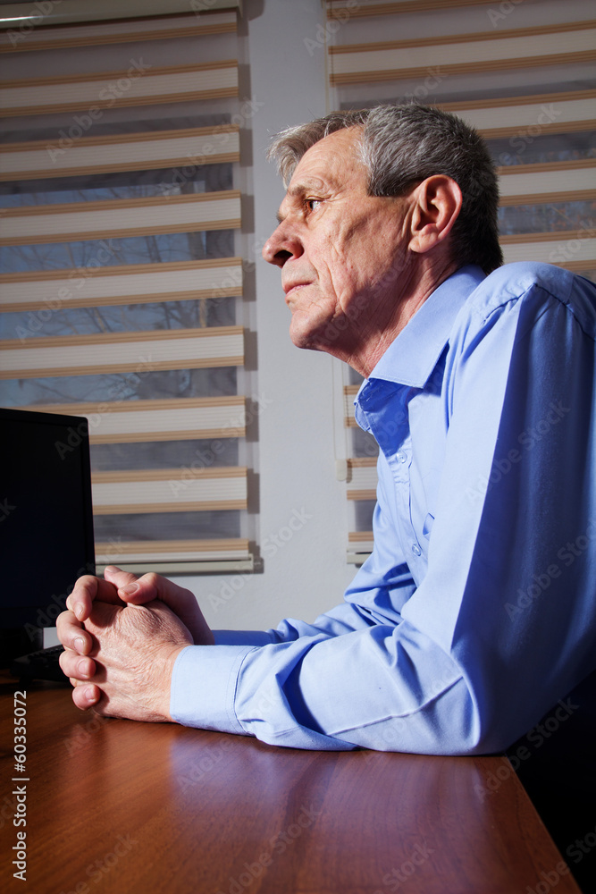 Fototapeta premium Mature Businessman has a problem at his work