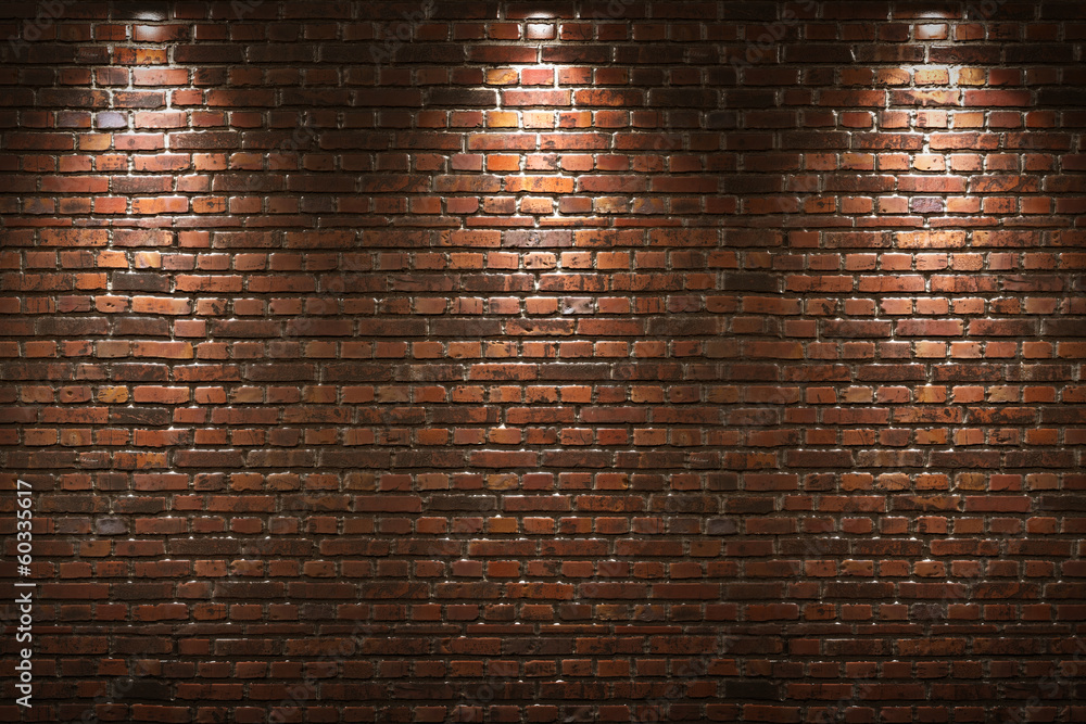 Illuminated brick wall - obrazy, fototapety, plakaty 