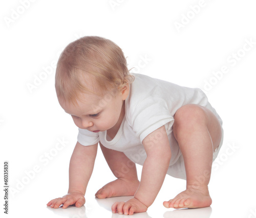 Obraz na plátně Adorable blonde baby in underwear crawling