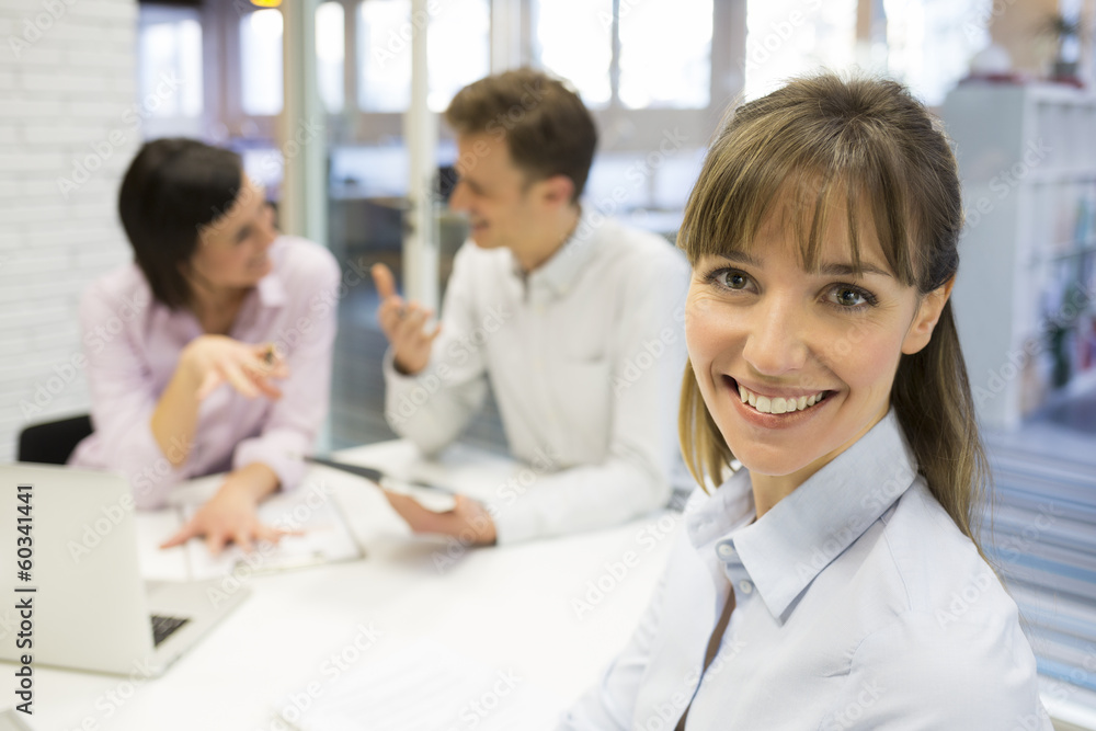 Portrait of smiling businesswoman during a meeting Portrait of smiling businesswoman during a meeting