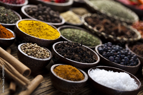 Spices on wooden bowl background  © Sebastian Duda