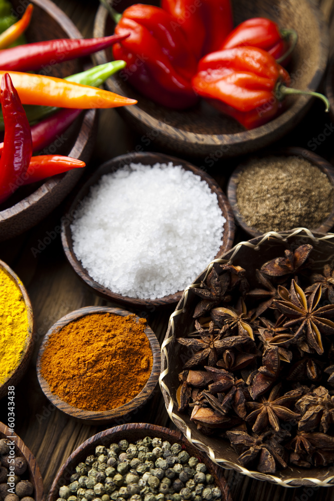 Spices on wooden bowl background Spices on wooden bowl background