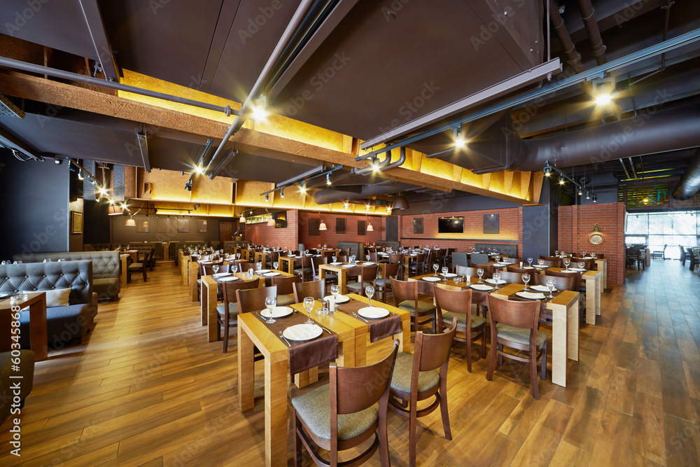 Interior of restaurant with wooden furniture