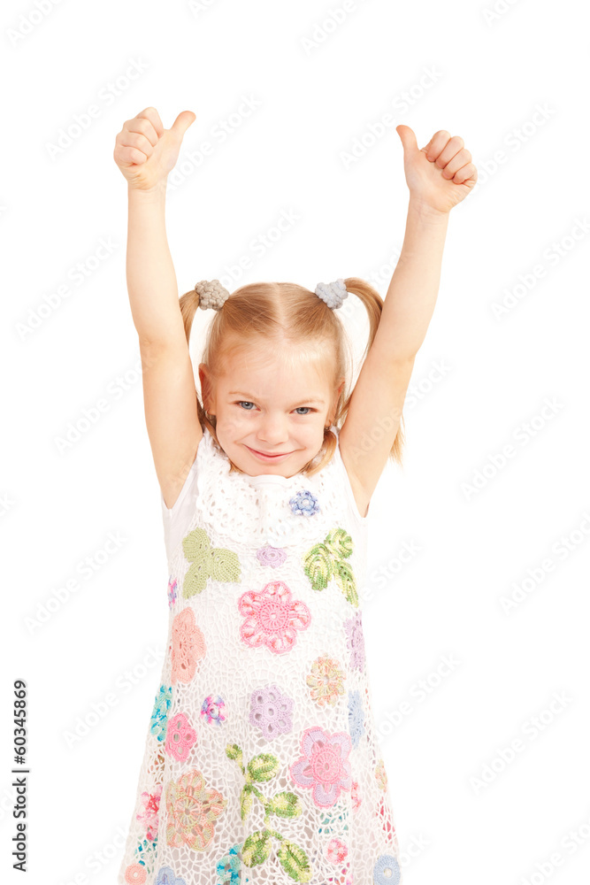 Smiling child showing thumbs up symbol Smiling child showing thumbs up symbol