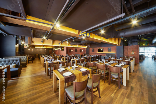 Interior of restaurant with wooden furniture