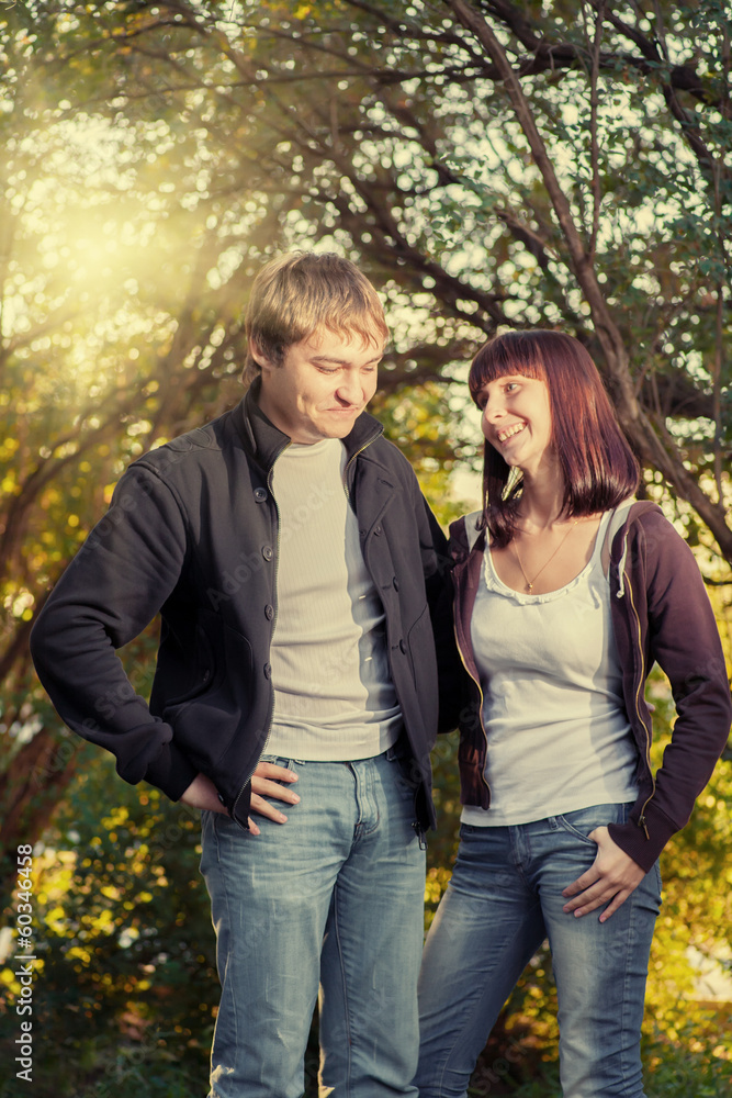 couple in love in the park on green couple in love in the park on green