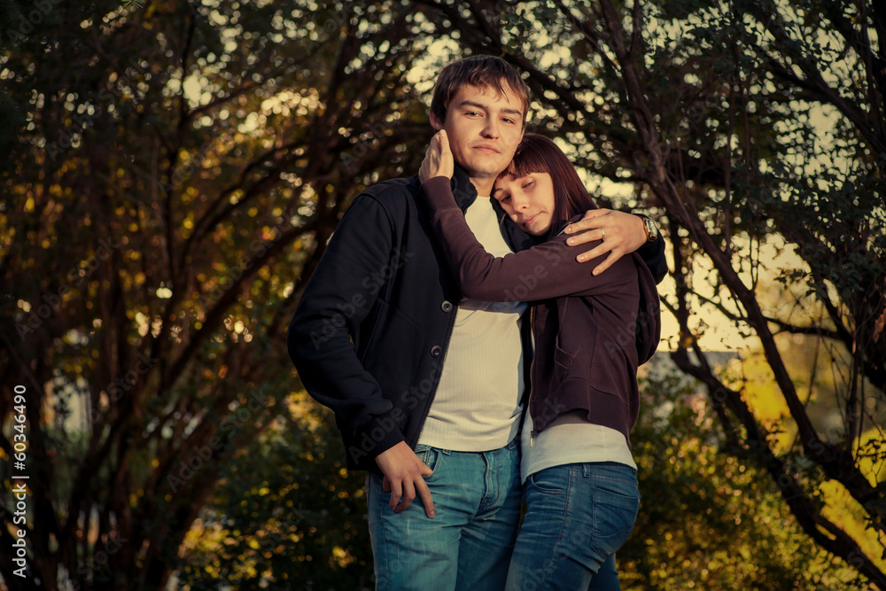 couple in love in the park on green couple in love in the park on green