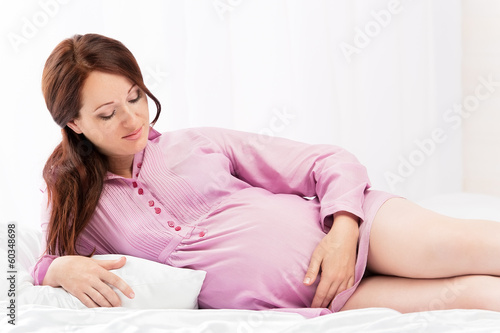 Portrait of the young pregnant girl