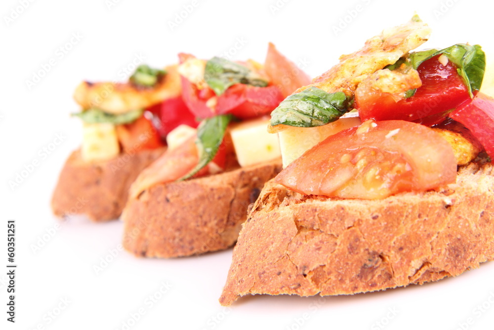 Sandwiches with chicken, tomato, cheese and bell pepper