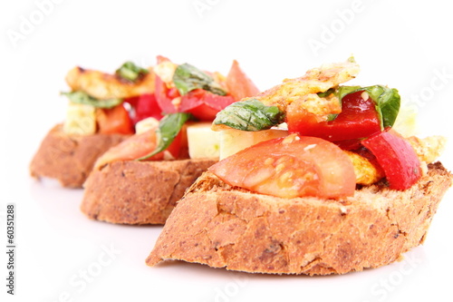 Sandwiches with chicken, tomato, cheese and bell pepper